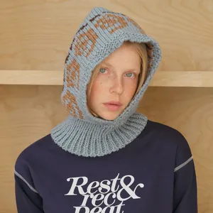 Light blue wool blend balaclava with brown rose jacquard pattern for winter warmth