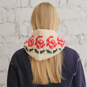Back view of wool blend balaclava with red rose jacquard and cream chunky knit texture