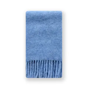Sky blue alpaca wool blend scarf with fringe tassels on a clean white background