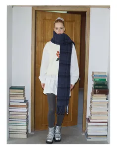 Winter look with blue plaid wool blend scarf and vintage style outfit in a library setting