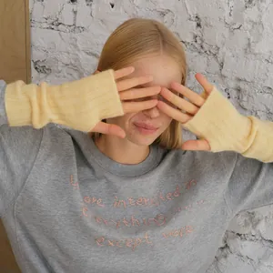 Pale yellow ribbed wool blend fingerless long arm warmer gloves for women in winter