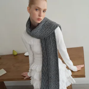 Dark grey wool blend cable knit scarf with thick herringbone texture for winter warmth