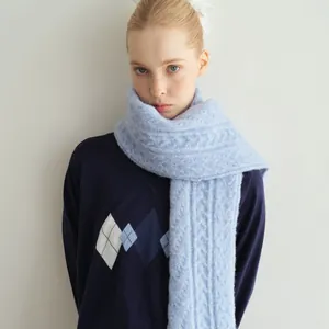 Light blue wool blend chunky cable knit scarf for women in a vintage retro style