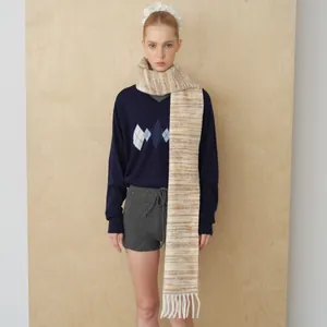 Women's gradient wool scarf with tassels paired with V-neck checkered knit sweater