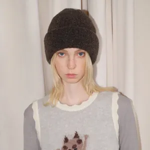 Thick dark brown wool blend beanie and light gray cartoon cat knitted vest for women