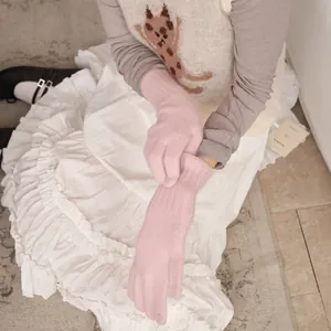 Pink long wool blend knit gloves with touchscreen feature and ribbed cuffs for women