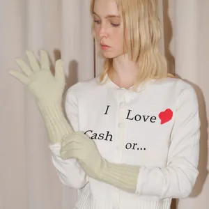 Long raccoon wool blend knit gloves in light green with warm ribbed cuffs for women