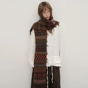 Vintage Fair Isle knit scarf in wool blend with retro patterns and fringe detail