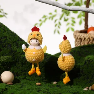 Easter plush yellow chick ornaments holding eggs for spring festive table decorations