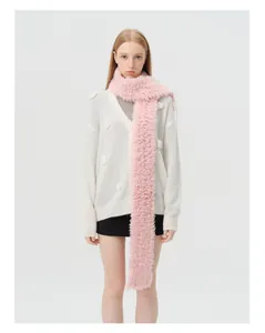Detail of pink long fleece wool scarf paired with white floral knit cardigan