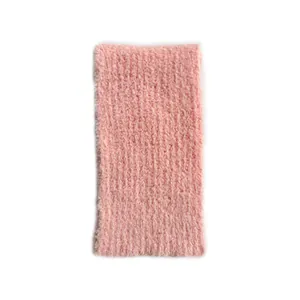 Soft pink wool blend knitted scarf featuring fuzzy texture for winter warmth