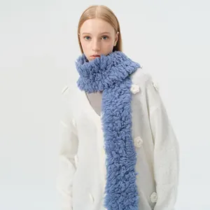Women's white knit cardigan with floral accents and soft blue wool blend scarf