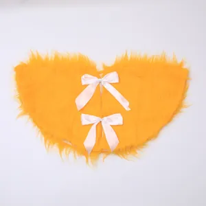 Golden Christmas tree skirt with plush white bows and luxury long faux fur decoration