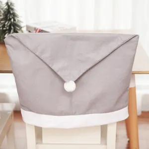 Grey Christmas hat chair covers made of soft non-woven fabric for holiday dining decor