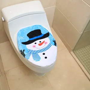 Detailed close-up of a blue snowman pattern toilet lid cover for Christmas bathroom decor