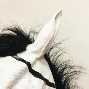 Realistic white horse head mask with black synthetic mane and textured skin for Halloween