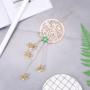 Christmas wooden bell hanger with green felt leaf and small golden jingle bells