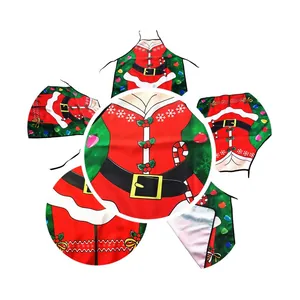 Macro view of Christmas apron featuring Santa suit print with snowflakes and holiday lights