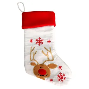 Detail of 20 inch Christmas stocking featuring embroidered reindeer and snowflakes