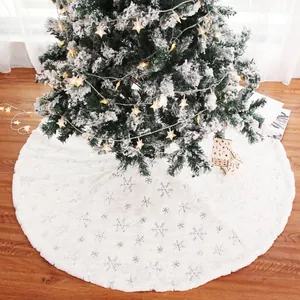 White plush Christmas tree skirt with silver snowflake embroidery for festive home decoration