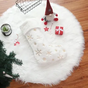 White plush Christmas stocking with gold snowflake embroidery for home holiday decor