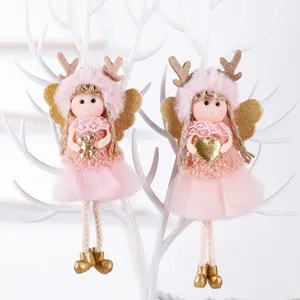 Pink angel Christmas plush ornaments with golden wings and sequins on white branch