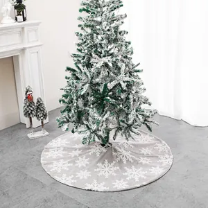 Grey snowflake Christmas tree skirt with plush texture for festive holiday decoration