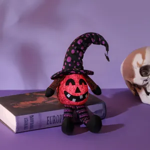 Light-up Halloween gnome doll with pumpkin head and spider charm decoration