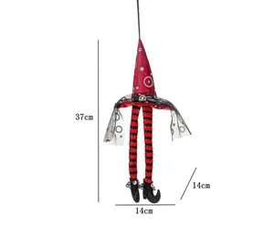 Detail view of a 37cm Halloween witch hat pendant with long striped legs and lace