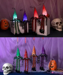 Macro detail of glowing LED witch hat ornaments with striped legs in four colors