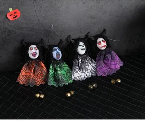 Close-up of four colorful Halloween ghost hanging decorations with spider web patterns