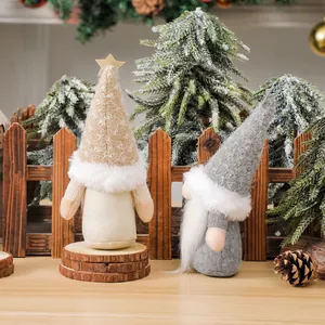 Christmas gnome figurines with sequin hats and wooden bases for festive tabletop decor