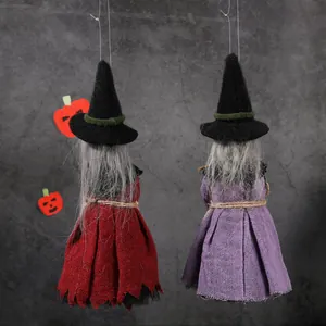 Lot de 2 sorcières d'Halloween suspendues avec jupes en toile de jute sur mur en pierre