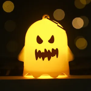 Glow Halloween ghost ornament with warm LED light and hanging ring for spooky party decor
