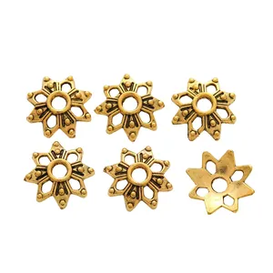 Vintage gold star-shaped alloy bead caps for DIY jewelry making with six-piece set view