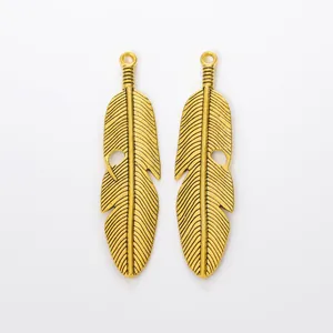 Détails de pendentifs plumes en alliage doré avec texture vintage pour création de bijoux