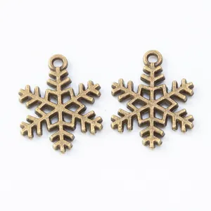 Vintage bronze snowflake alloy pendants for DIY jewelry making and holiday decorations