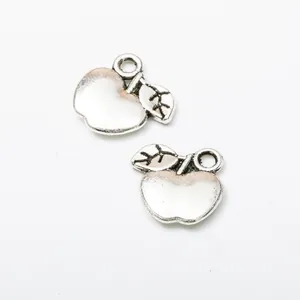 Pair of vintage silver apple pendants with detailed leaves for DIY jewelry making