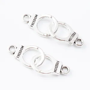 Vintage silver zinc alloy handcuffs charm with engraved Freedom text for DIY jewelry