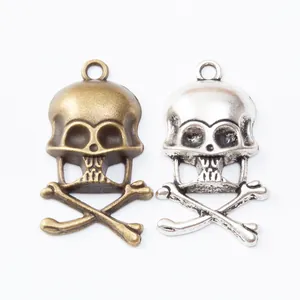 Vintage zinc alloy skull and crossbones pendants in bronze and silver for DIY jewelry