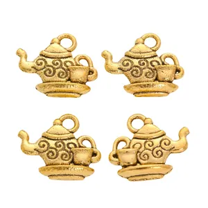 Vintage gold alloy teapot charms with intricate scroll patterns for DIY jewelry making