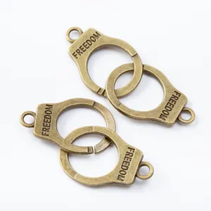 Vintage bronze handcuff charms with Freedom engraving for DIY jewelry making