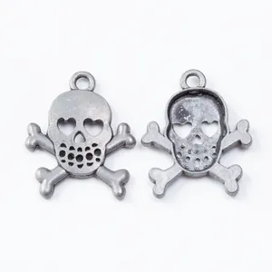 Vintage silver skull and crossbones metal pendants with heart-shaped eyes for DIY jewelry