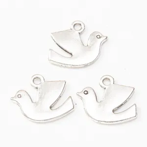 Three vintage silver peace dove alloy charms with ring hooks for DIY jewelry making