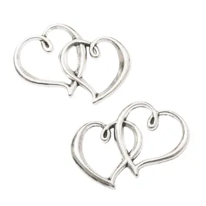 Pendentifs cœur double en alliage argenté vintage au design rétro ajouré et entrelacé