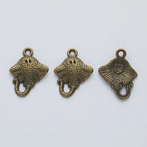 Three vintage bronze stingray alloy pendants with detailed texture and top loop holes