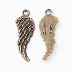 Vintage bronze-plated S925 silver wing-shaped pendants with detailed feather texture