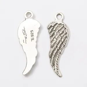 S925 silver angel wing charms with detailed feather texture and antique silver finish