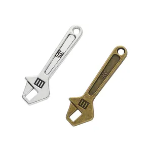 Colgantes vintage de llave inglesa en aleación plata y bronce para joyería DIY y llaveros