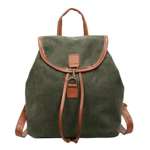 Retro green corduroy backpack with brown leather trim and drawstring closure for women